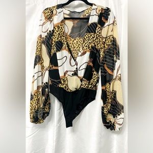 Women’s Chiffon Body suit. Black/combo. Medium. Never worn